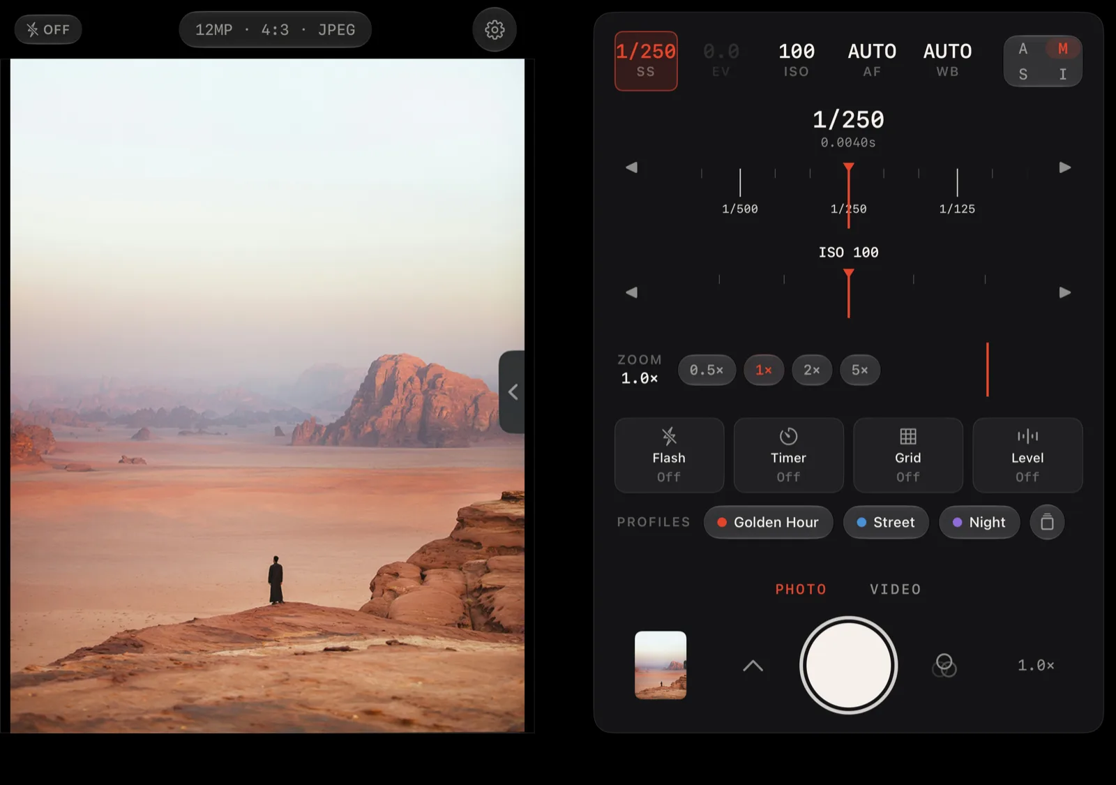 Lucid Camera on iPhone Duo open display showing a desert photo in the viewfinder on the left half and the Manual grip on the right, with shutter speed and ISO as two live dials